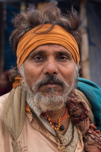 strained expressions a miserable devotee in kumbh mela abhishek dhupar punjab creativehut