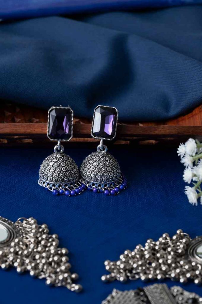 solitaire redeem yor choise earring earring photography-jwellery photography by sanal sunny thrissur