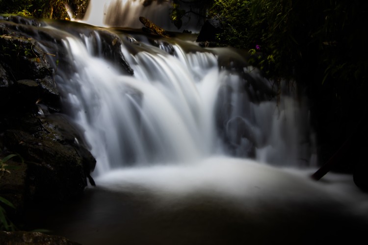 the slow fall view of a stream-by-a-slow-shutter-speed sanal thrissur creativehut