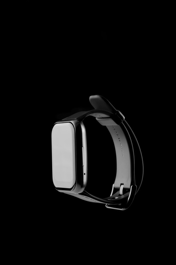 black smart watch on black background