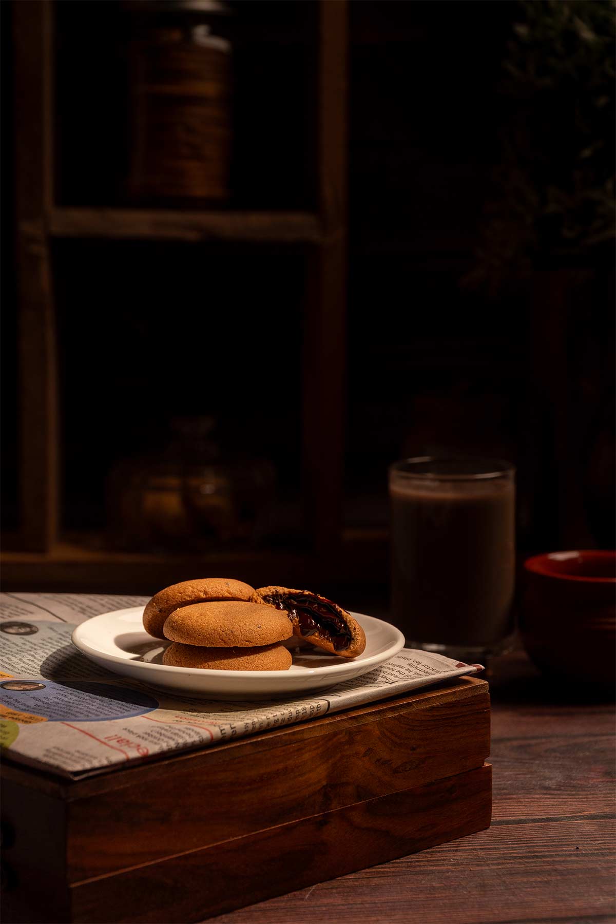 chocolate flowing from biscuits