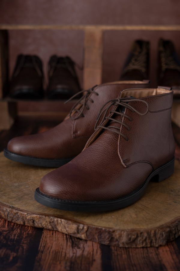 boots on a wooden stand