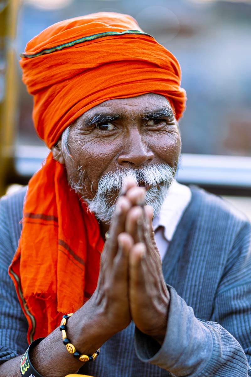 old sadhu joining hands