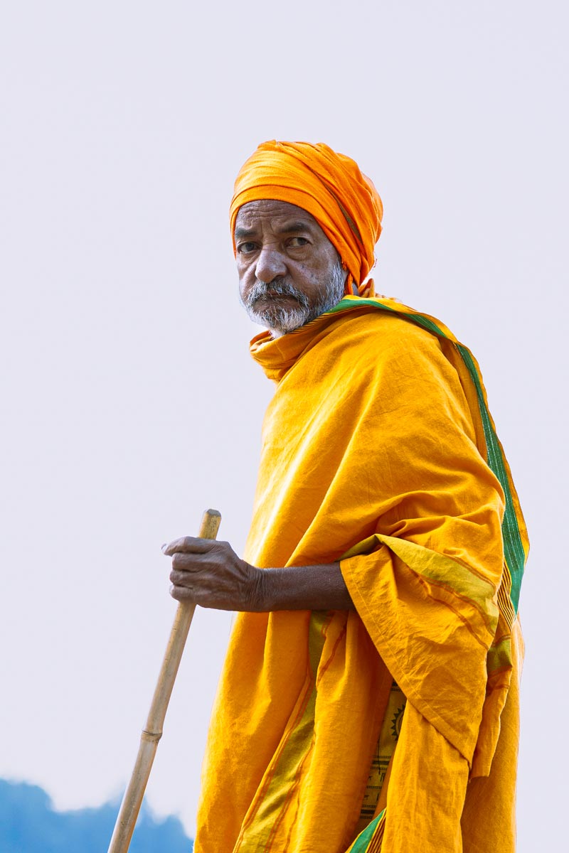 old sadhu with stick