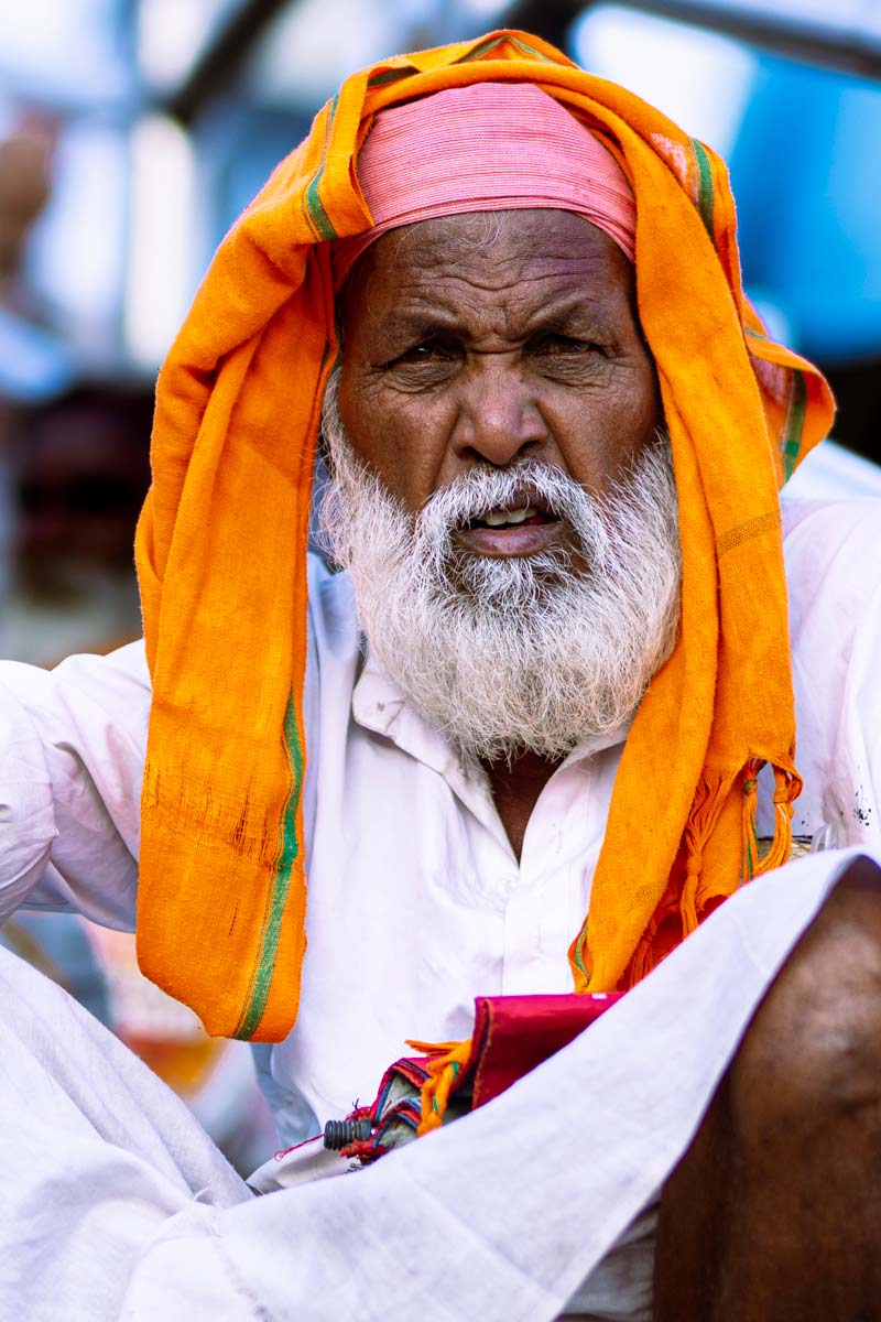 old sadhu watching in camera