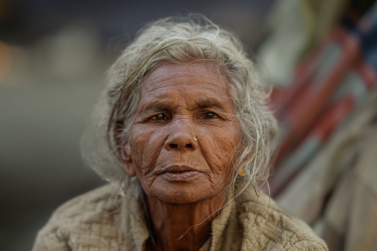 a aged lady in slums