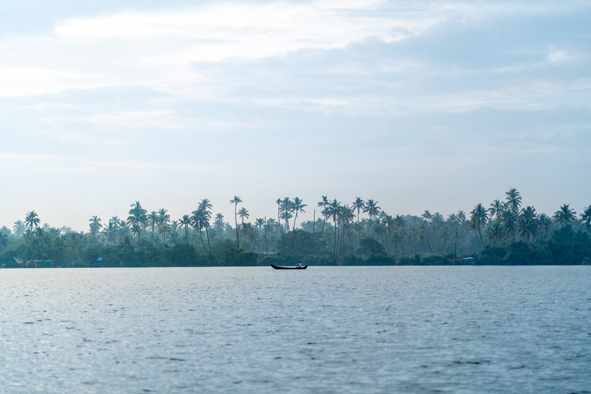 A fisherman fishing alone in the river.