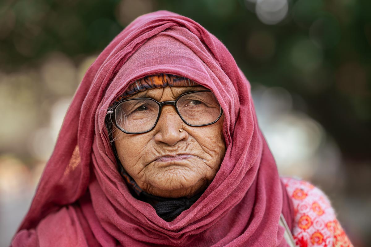 a aged woman is weared a spects