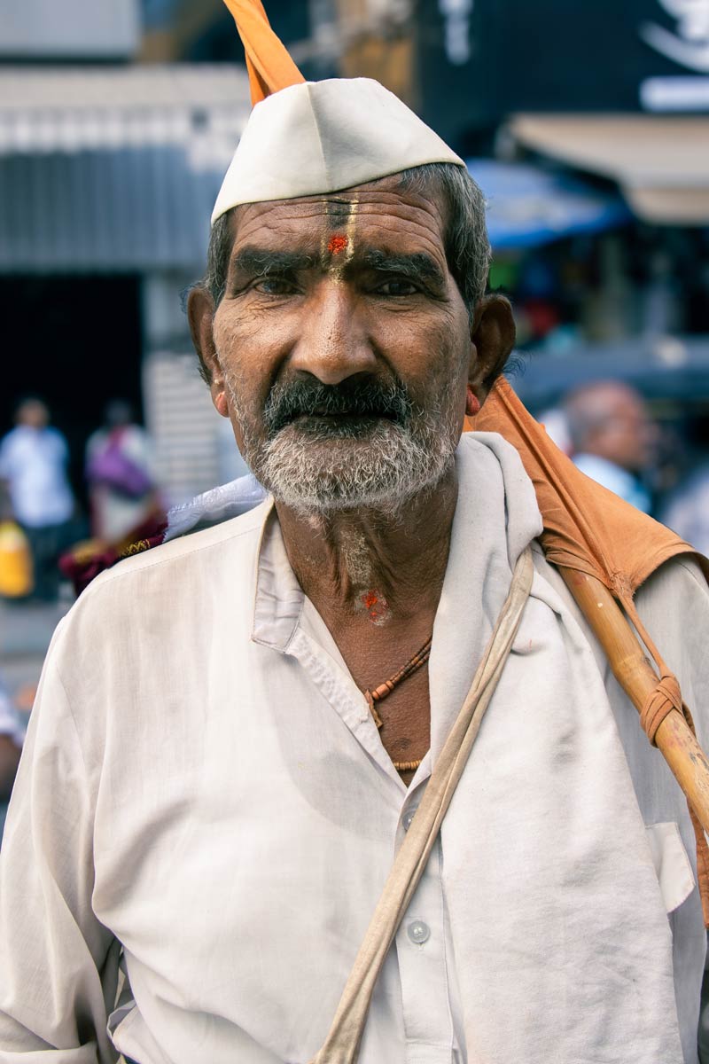 a old man holding a flag