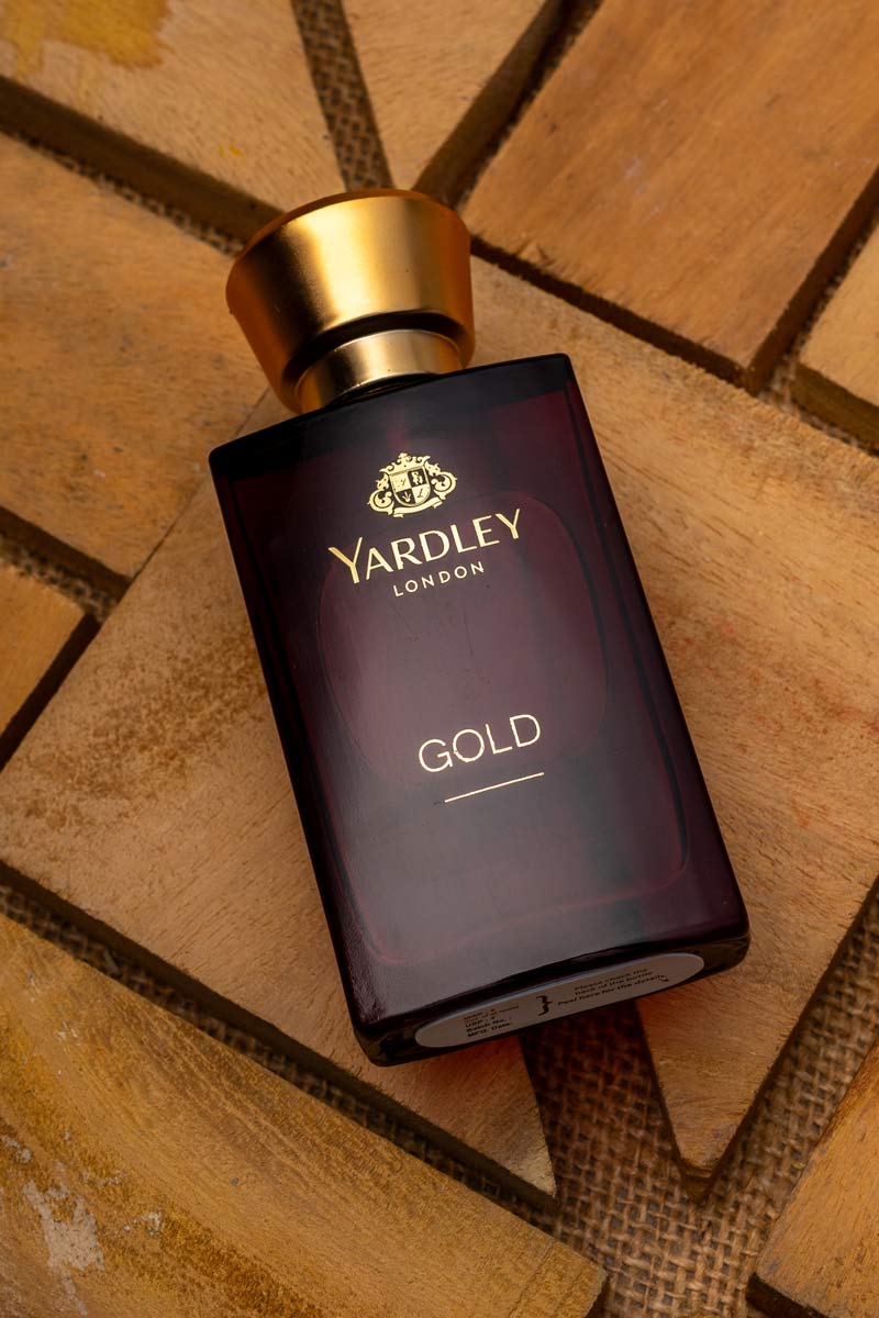 A yardley perfume on a wooden pattern.