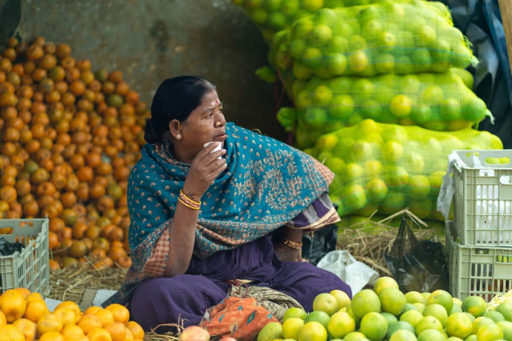 A photo of a lady having her coffee.