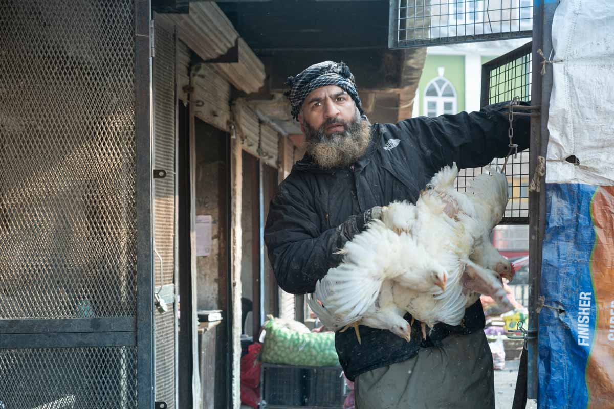 a man delivering chicken