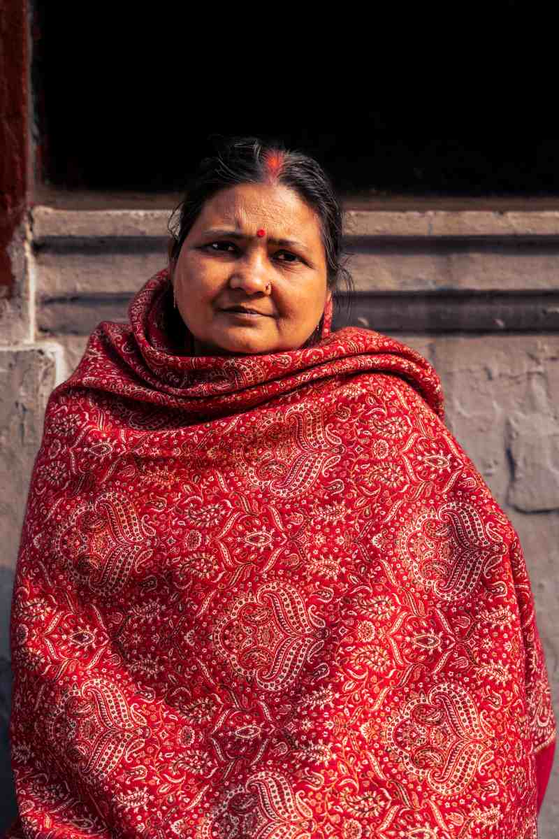 cultural reflection in red shawl