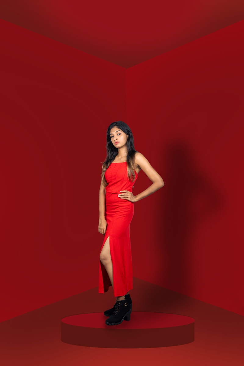 girl with red dress stading and posing