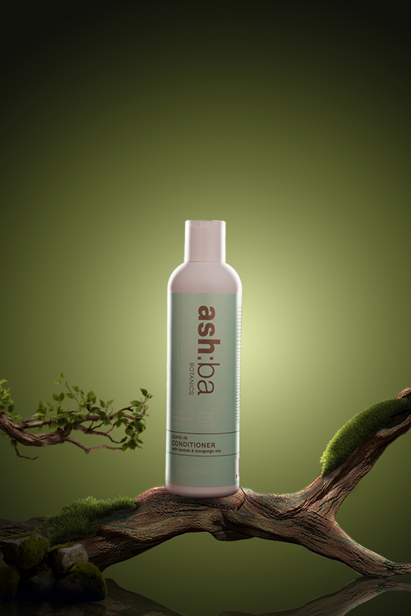 leave in conditioner placed on a wooden branch