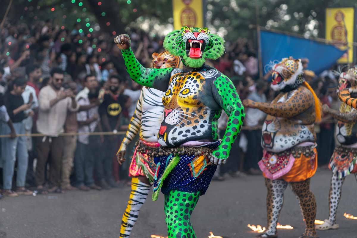 green painted tiger dancing alone