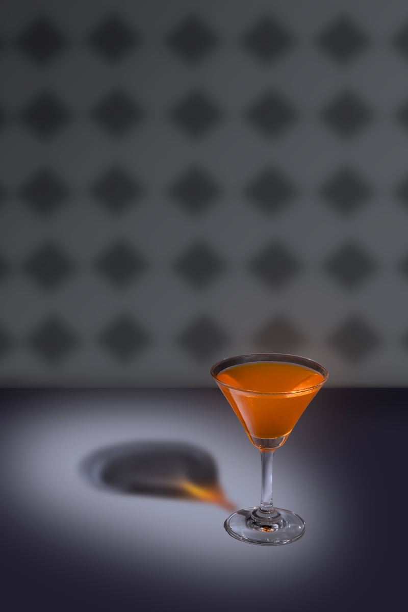 Orange martini on a spotlight