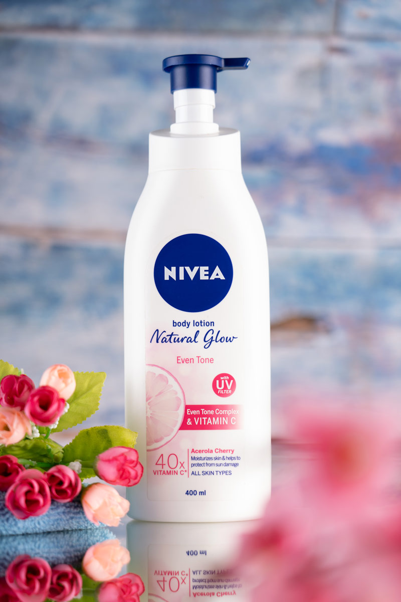 Natural glow body lotion with flowers.