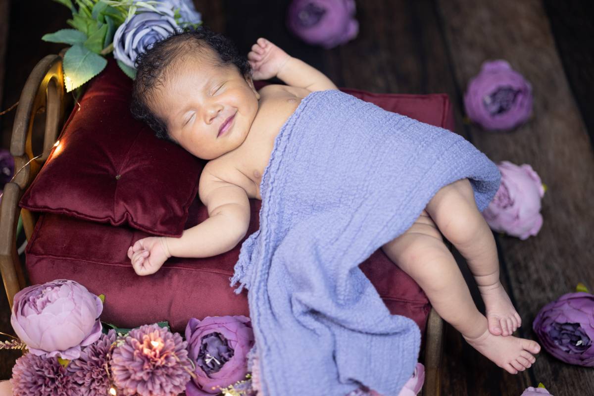 cute baby smiling and sleeping