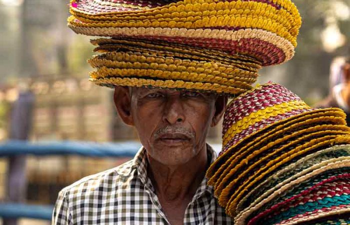 Street style of a hat vendor