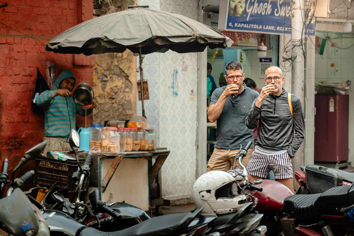 two people drinking tea