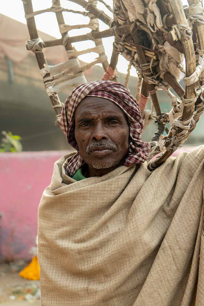 Oldman cover himself from sun