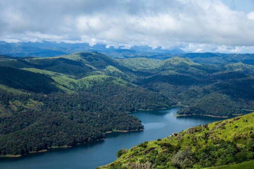 A Blue water reservoir in a hilly landscape