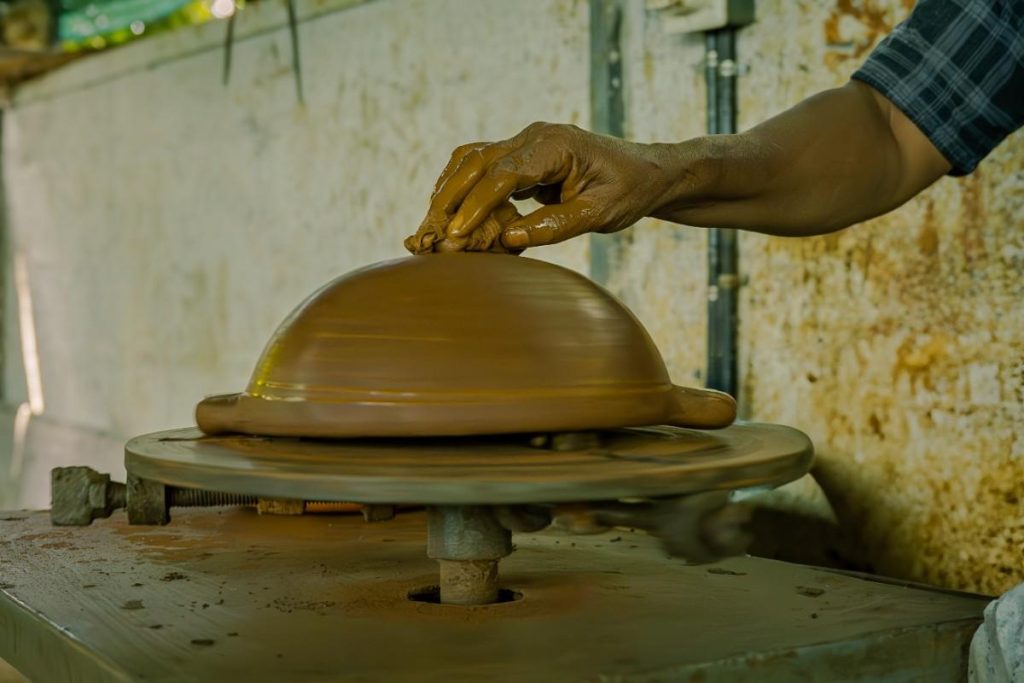 Makes the earthen pot in the right shape