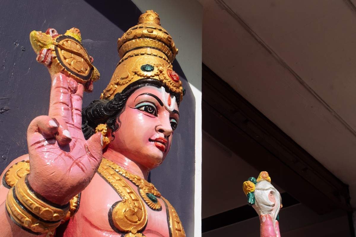 A closeup view of a sculpture's face from temple.