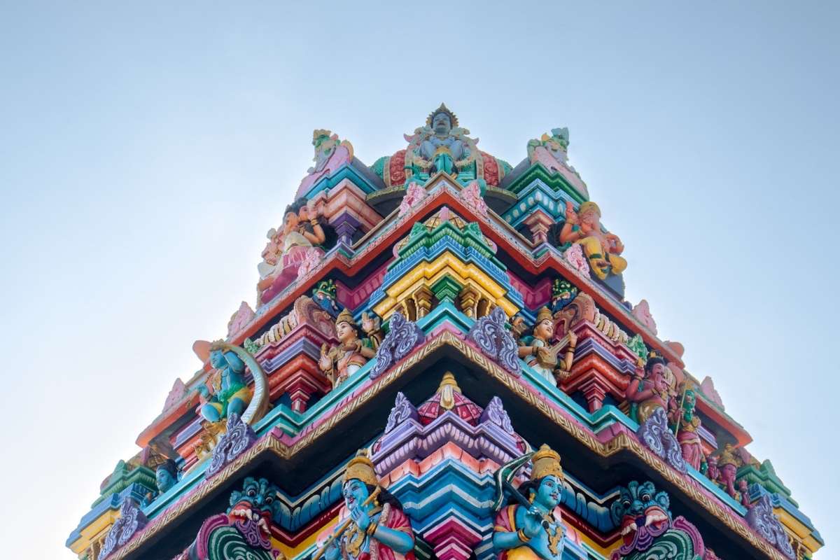 A frontview of dome's colorful sculptures of a temple.