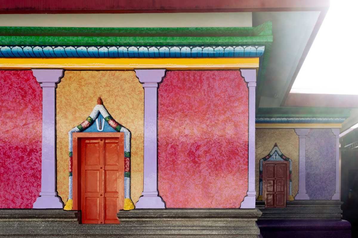 A front view of 2 walls of Vaishnava temple with 2 different colors