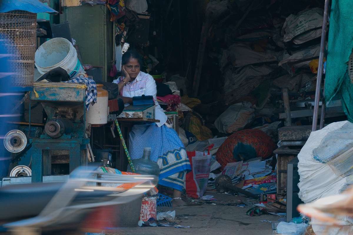 Threads of life weave through a busy street.