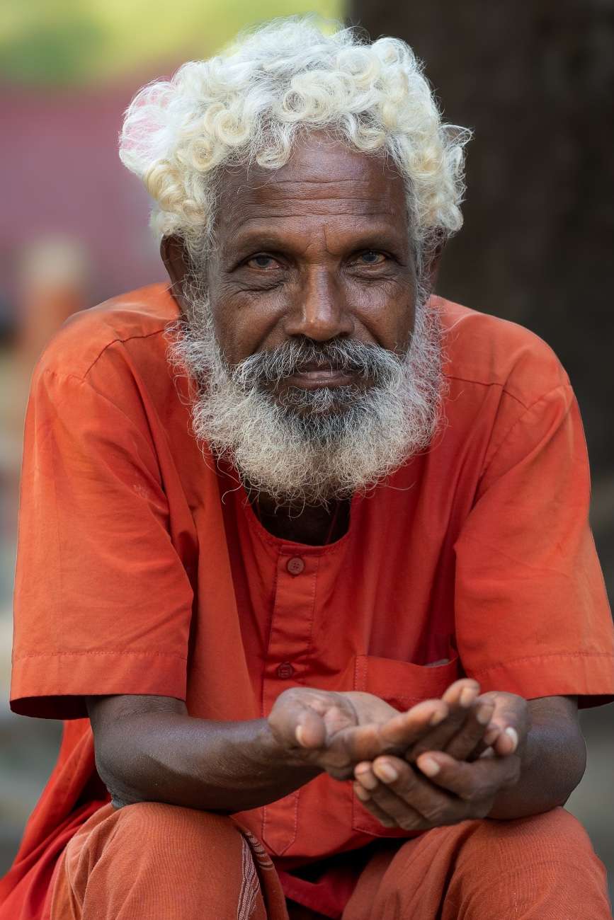 Heartfelt smile reflecting wisdom and warmth.