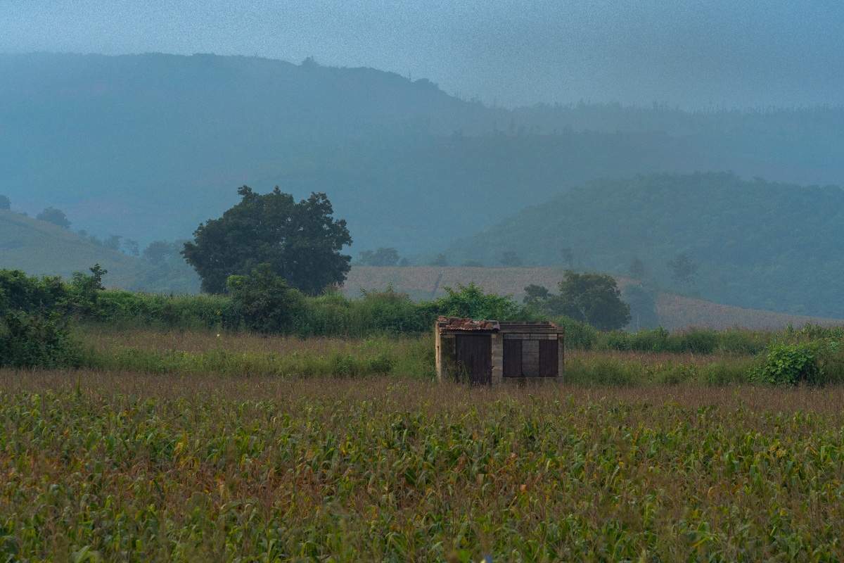 Abandoned Charm of a shed in mountain valley.