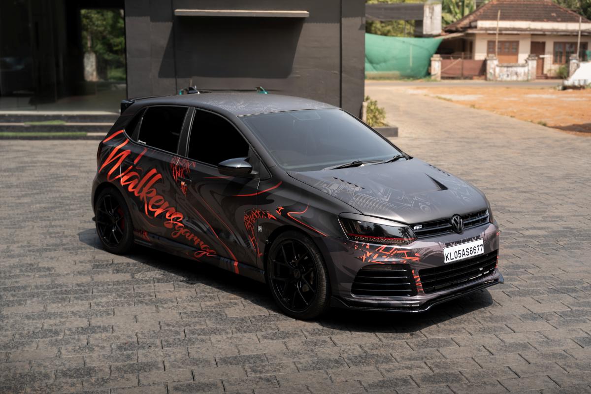 Modified Volkswagen with unique wrap, Custom Hatch.