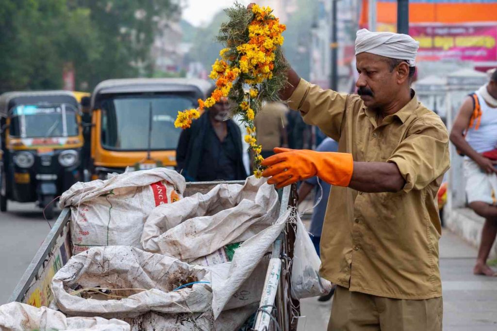 A person sweeping, brightening the surroundings