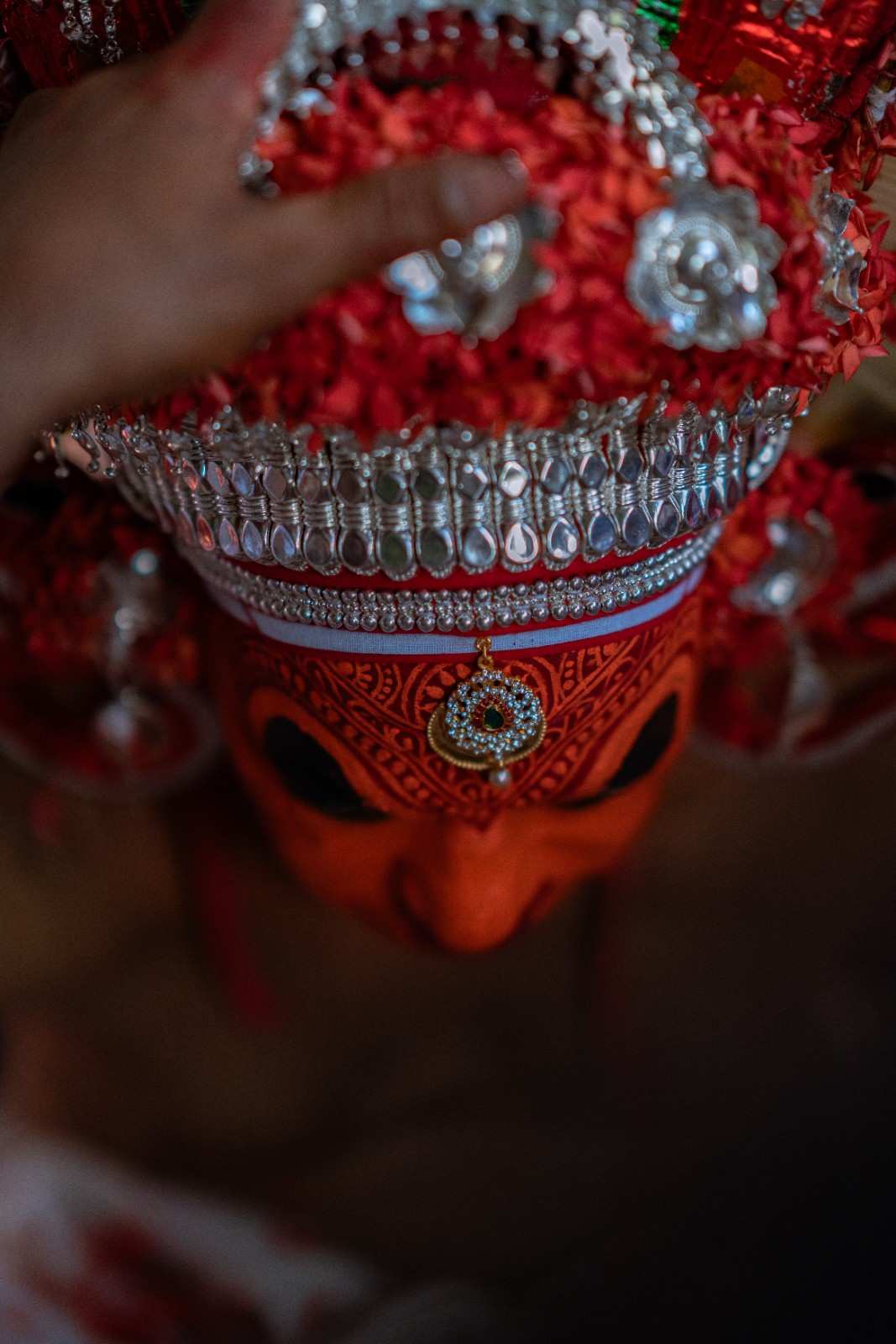 Detailed head gear of theyyam performer
