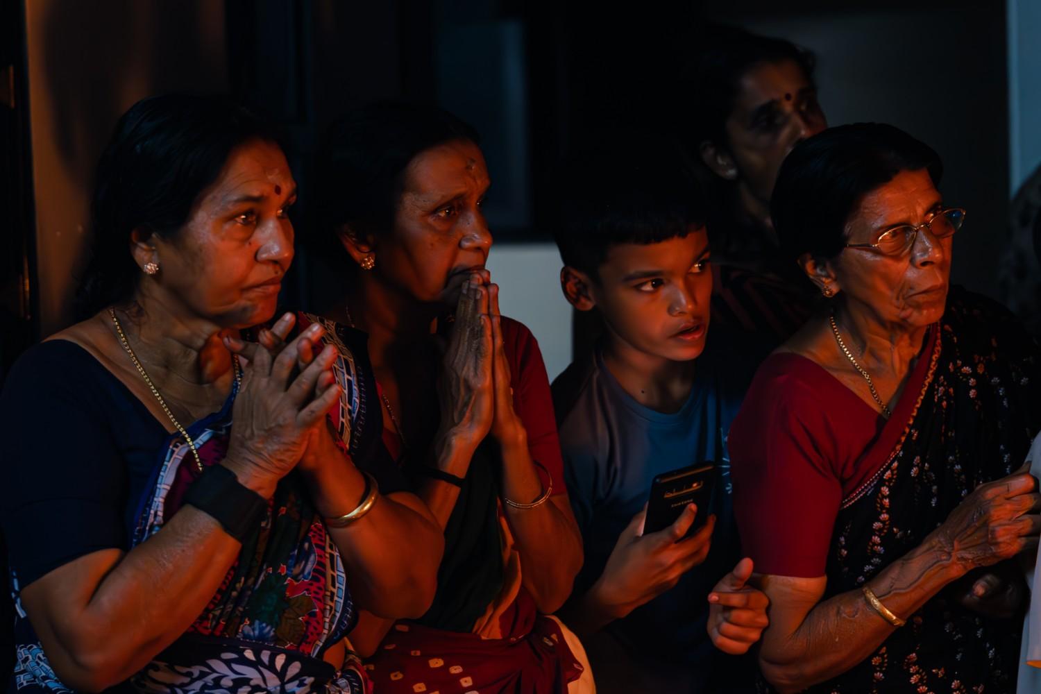 Devout expressions of devotees watching the performance