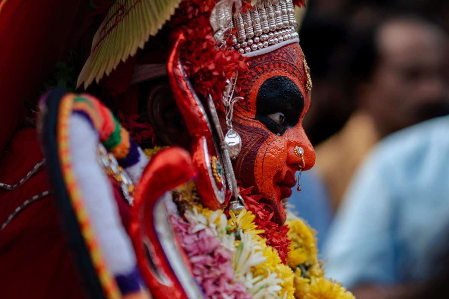 Divine mask of theyyam performer