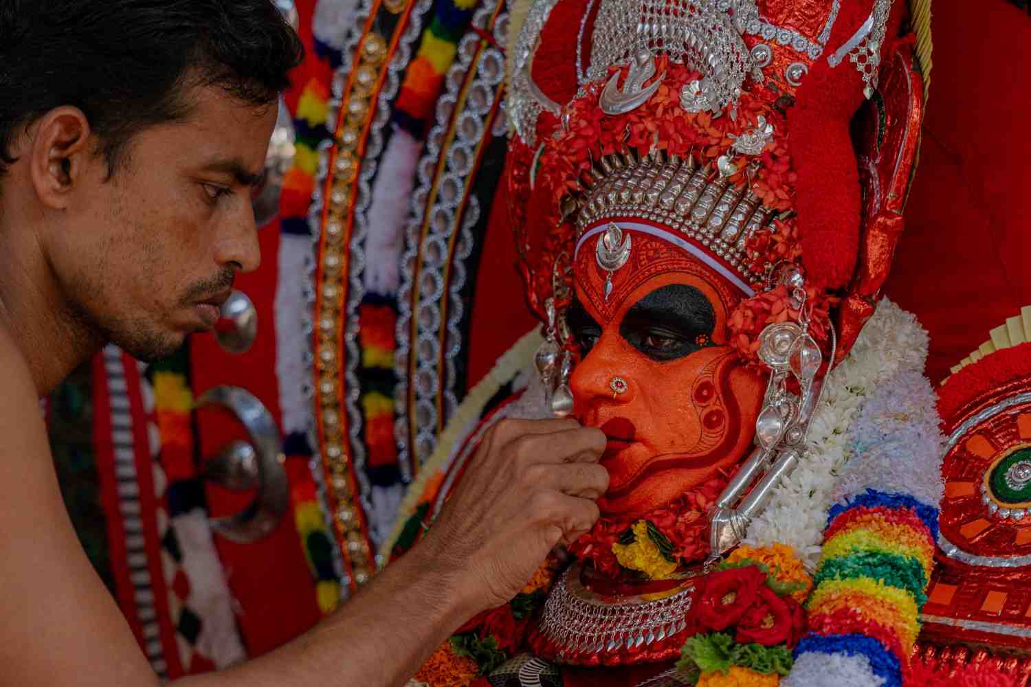 Divine touch of theyyam performer 