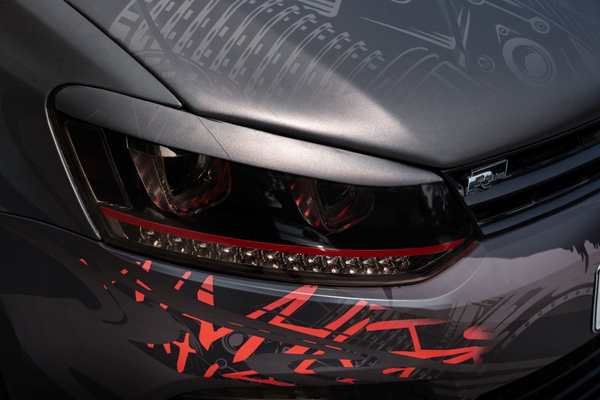 Custom headlights with sharp detailing, Fierce Gaze.