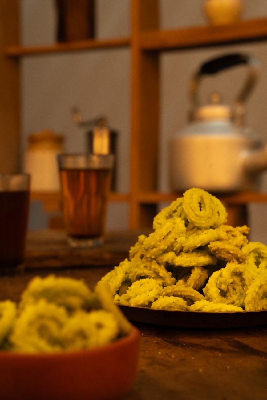 a bowl of green golden spirals 