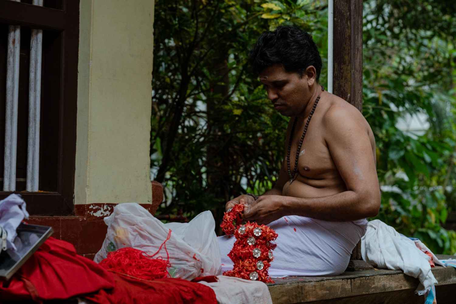 Artist preparing ritual attire