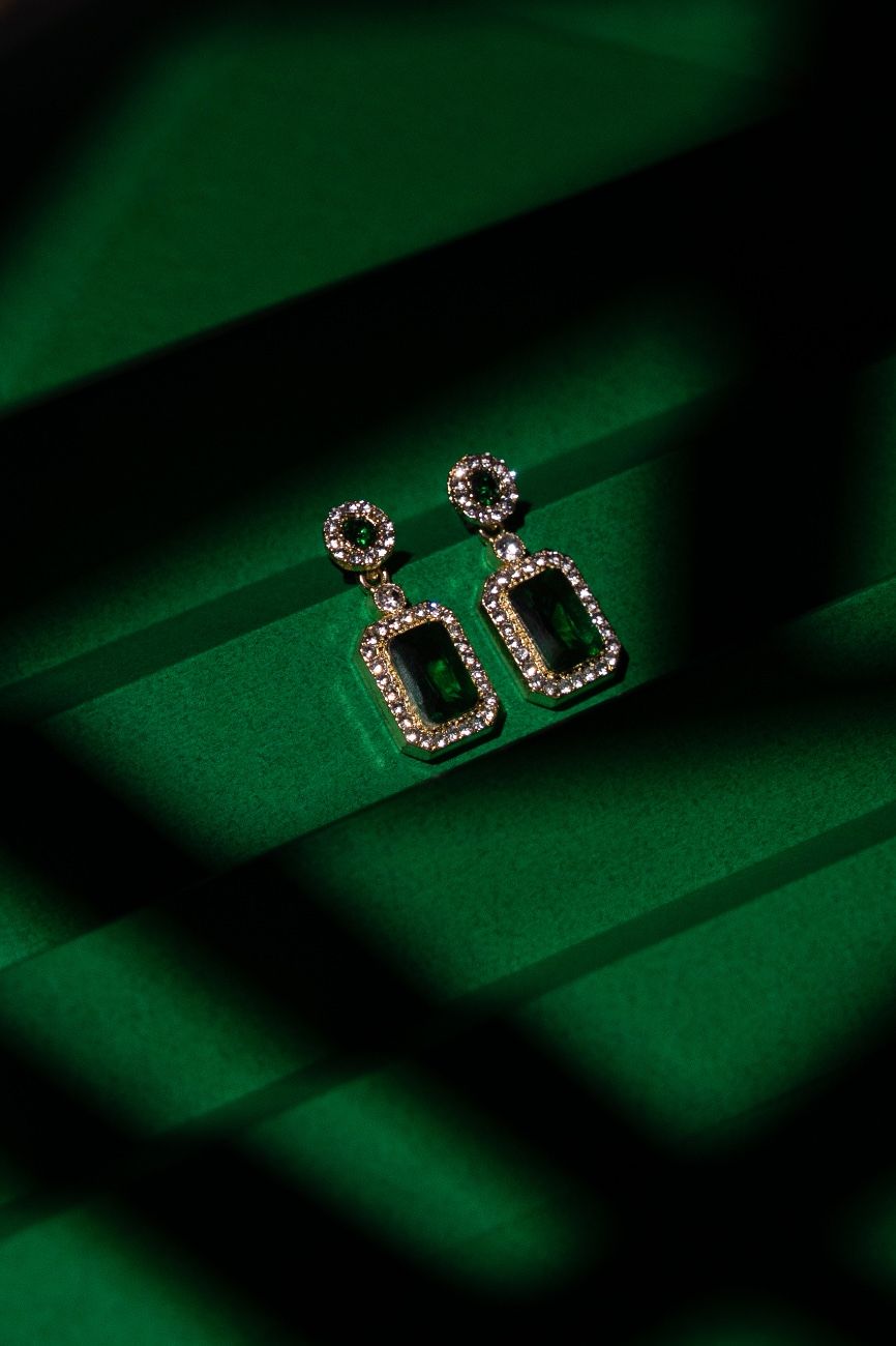 jewels of envy in green background