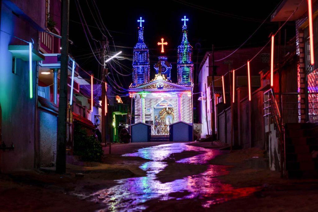 Lively Streets  A street with a church lit. 