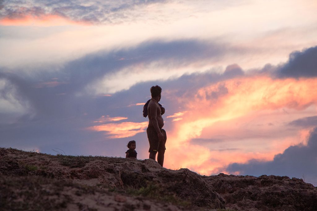 Nature’s Bond A father and daughter watching sunset.