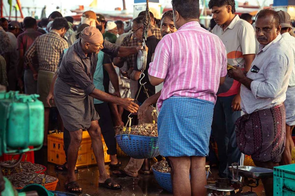 Weight of the fish is noting down for precision in trade.