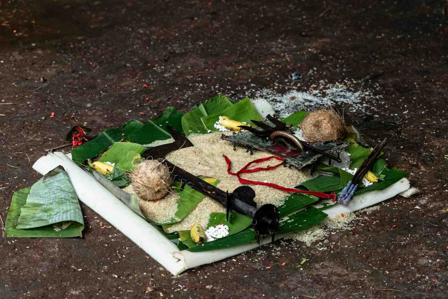 Ritual offerings on banana leaves.
