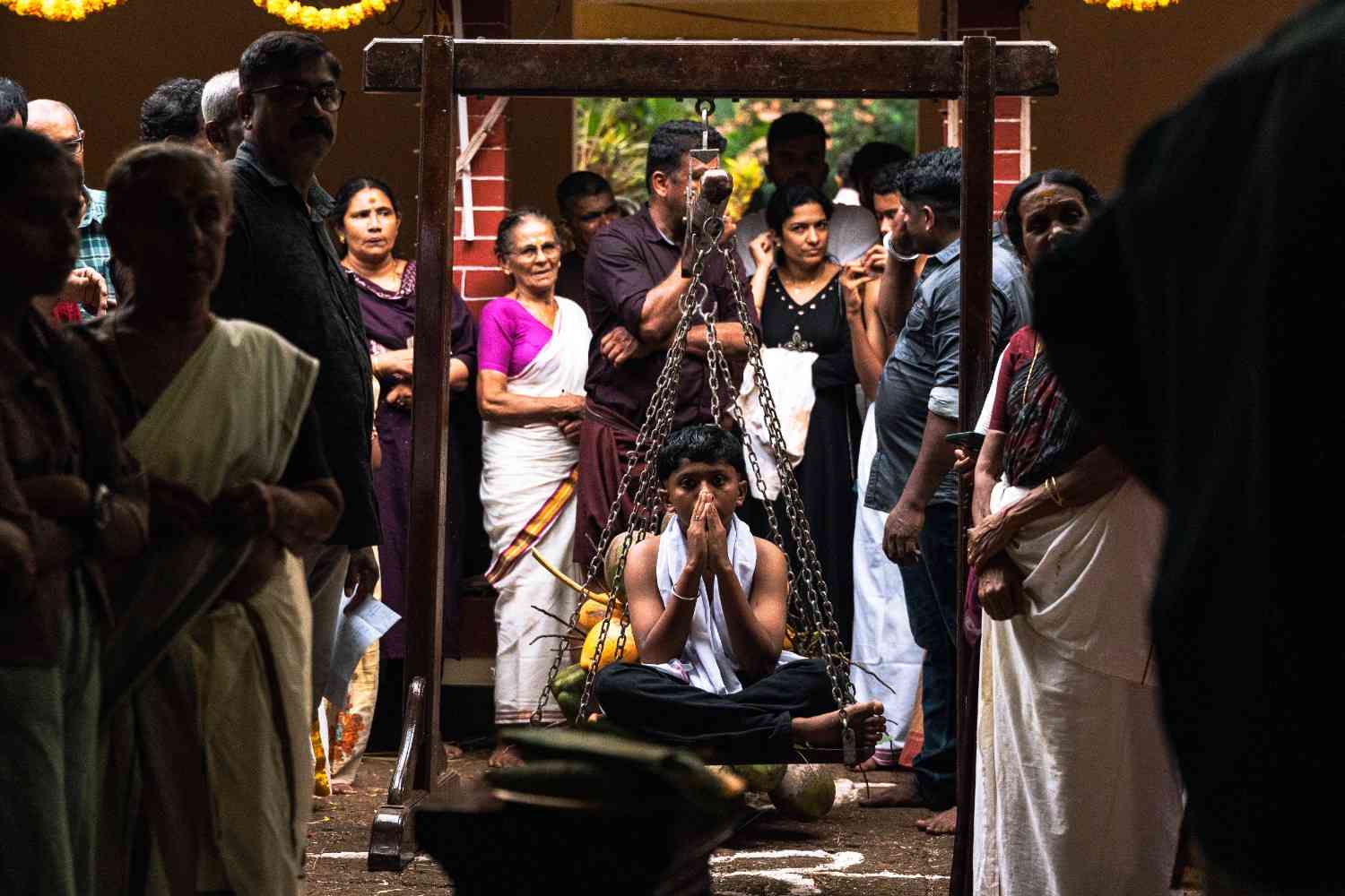 sacred weighing captivated audience observes the sacred weighing ritual.