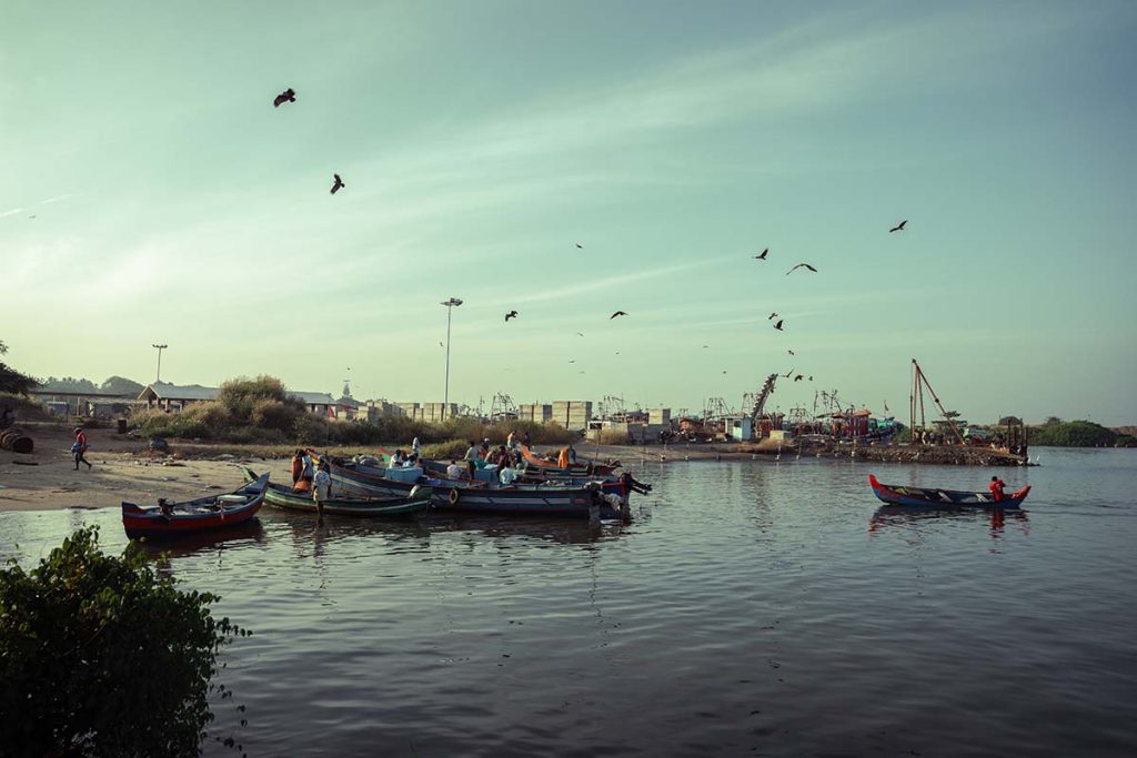 The shoreside market where the local fishermen gather with their catch.